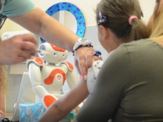 Innovativa ricerca scientifica su vaccinazione pediatrica e robot